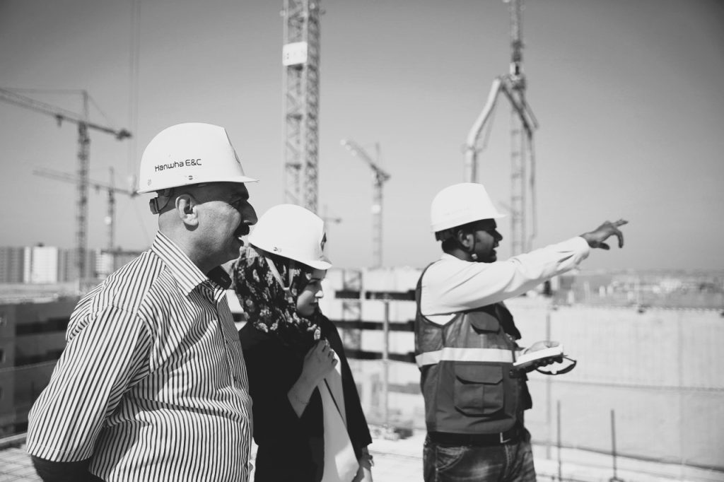 Construction site team discussion